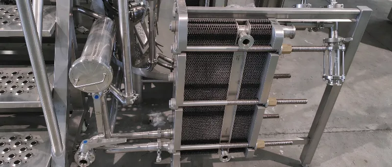 2L stainless steel pipe filter for breweries, designed for inline filtration of wort or beer. Sanitary construction with mesh screen and tri-clamp connections for easy installation and cleaning.
